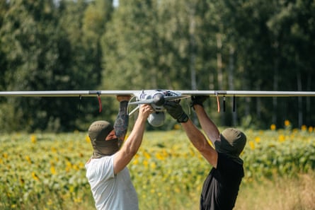 Troops in Ukraine make adjustments to a Tekever AR3 Evo 2 reconnaissance drone.