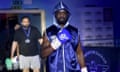 Sherif Lawal walks to the ring at Harrow leisure centre