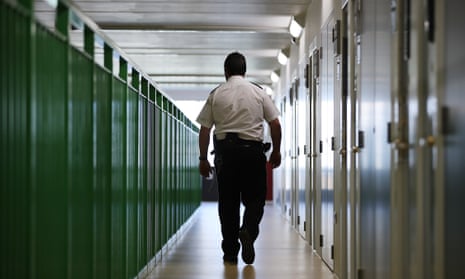 A prison guard walks through HMP Berwyn in Wrexham