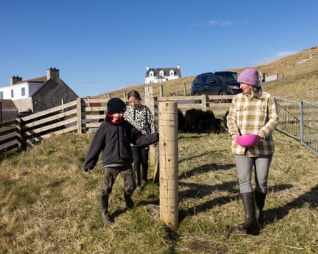 Triona MacKinnon and her children in a field