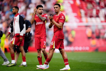 Trent Alexander-Arnold applauds the fans after the draw against Arsenal at Anfield