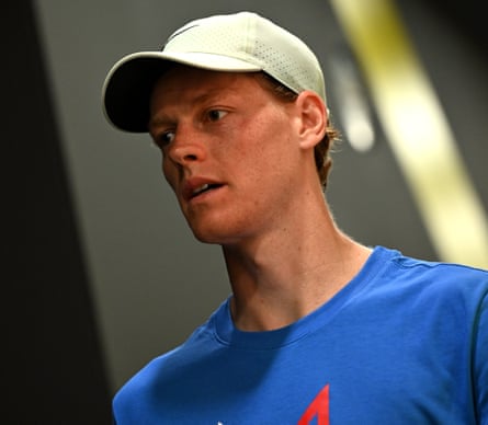 Jannik Sinner looks on during a training session