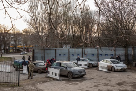 Cars coming from occupied territories are checked in a police station in Zaporizhzhia