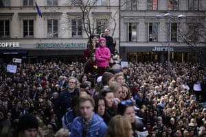 Thousands attend a vigil against terrorism after a hijacked truck was driven into a crowd of pedestrians and crashed into the department store in the Swedish capital last week.