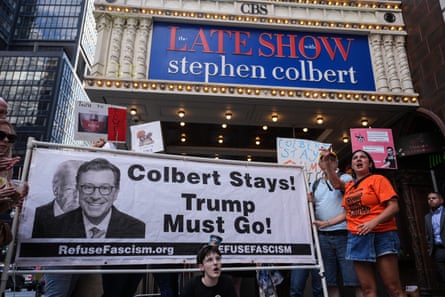 Anti-Trump protesters gathered outside the Ed Sullivan Theater, home of the Late Show with Stephen Colbert.