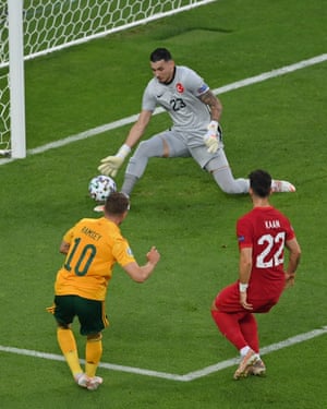 Aaron Ramsey has his shot saved by Turkey’s Ugurcan Cakır .