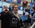 Options trader Anthony Spina points while shouting on the New York Stock Exchange floor
