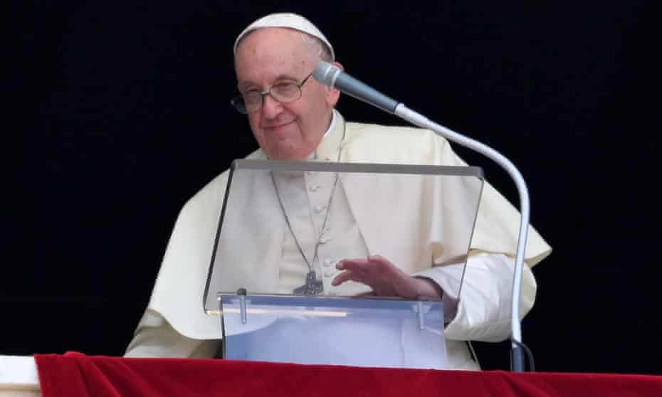 Pope Francis leads the Regina Coeli prayer from the window of his office at the Vatican City in May.