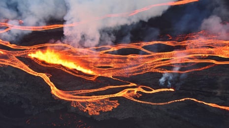 Hawaii volcano: aerial footage shows Mauna Loa spewing lava – video