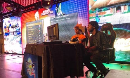 Competitors take part in a bout at the Dragon Ball FighterZ launch event