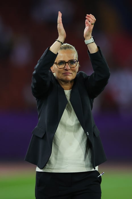 Sarina Wiegman acknowledges the England support after the match