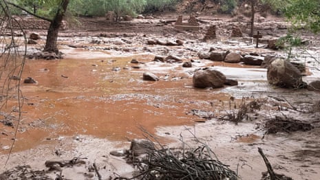 flooded creek filled with mud