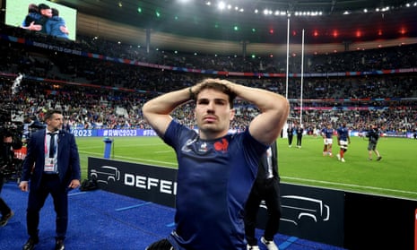 A dejected Antoine Dupont looks at the crowd following France’s quarter-final exit to South Africa.