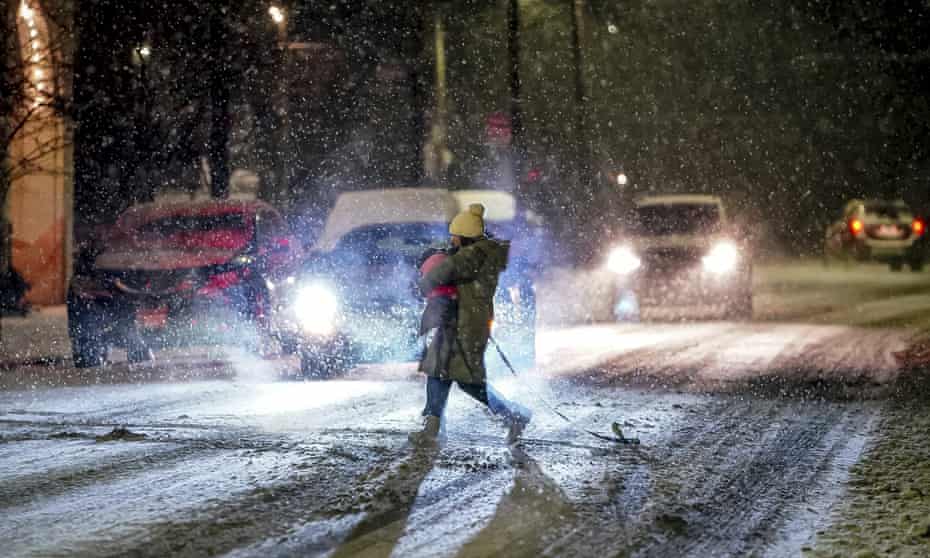 Winter storm brings snow, strong winds and thunderstorms to US north-east |  US weather | The Guardian