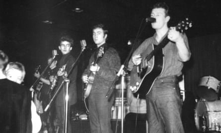 George Harrison, John Lennon and Tony Sheridan performing on stage