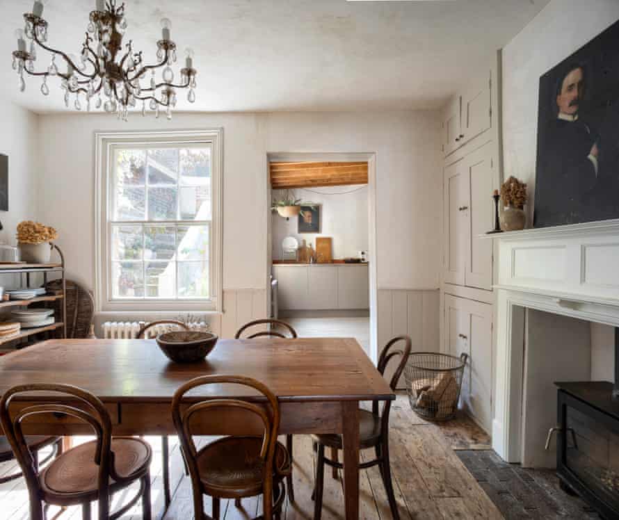 You are being served: crockery and placemats for the dining room are displayed on an open-shelved antique bakery trolley bought from Hendy’s Homestore in Hastings.