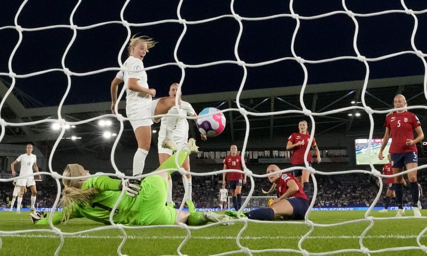 England’s Beth Mead (centre left) scores her third goal and England’s eighth.