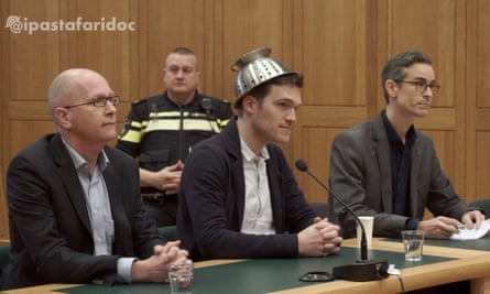 Mathé Coolen, an "archbishop" of Pastafarianism, wearing his colander in court
