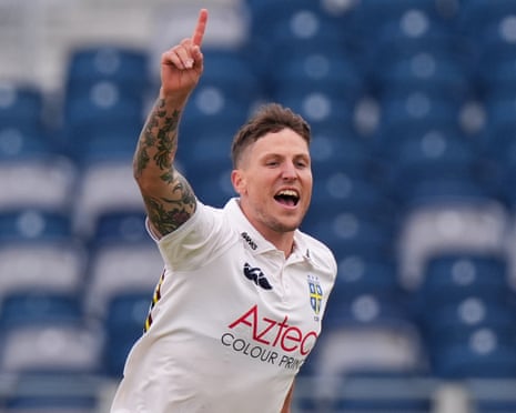 Durham's Brydon Carse celebrates the wicket of Gloucestershire's Joe Phillips.