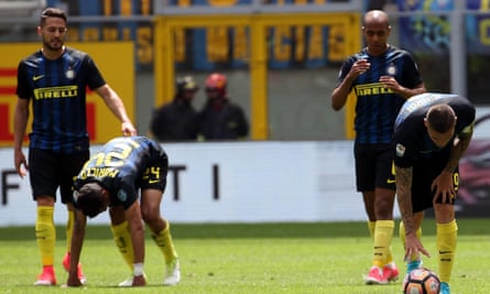 Inter players, including the captain, Mauro Icardi, far right, try to pick themselves up after conceding against Sassuolo.