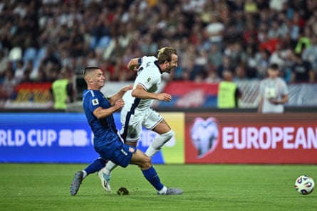 The Nottingham Forest defender Nikola Milenkovic was sent off for this tackle on Harry Kane.