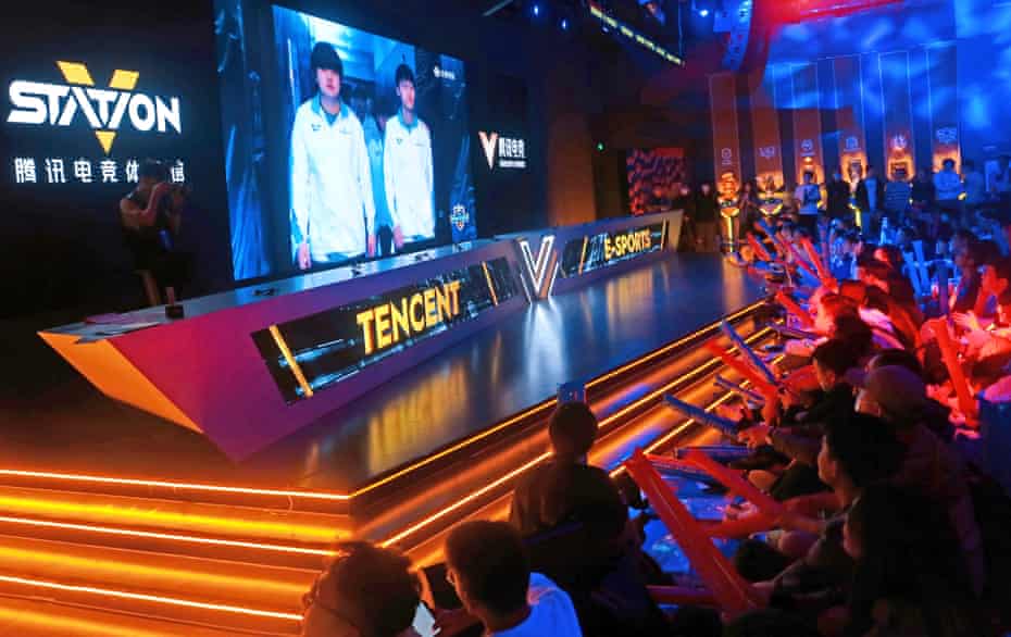 Esports fans at the Tencent V-Station watch the live broadcast of the League of Legends S10 finals in Shanghai in October 2020.