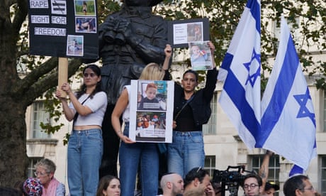 People attending the vigil outside Downing Street for victims and hostages of Hamas attacks, on 9 October 2023.