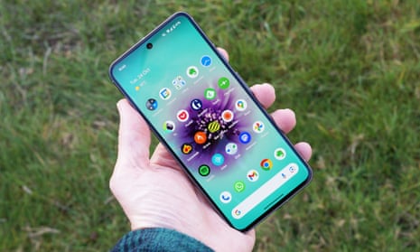 Google Pixel 8 pictured in a hand.