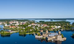 Aerial view of Savonlinna, in Finland, with its 15th-century Olavinlinna fortress and opera festival venue in the foreground.