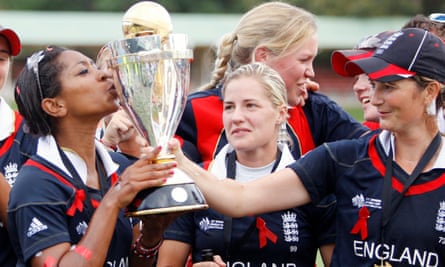 Ebony-Jewel Rainford-Brent, left, kisses the World Cup trophy held by the England captain, Charlotte Edwards, in 2009.