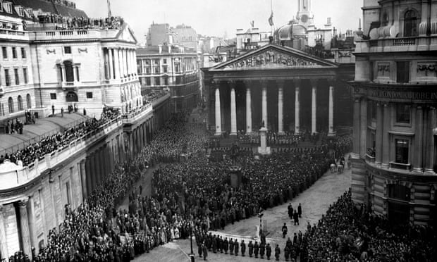 Crowds gather at the Royal Exchange to hear the reading of Queen Elizabeth II's Proclamation of Accession in 1952.