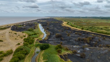 Hilltop at Wild Ken Hill with a long strip of burnt ground