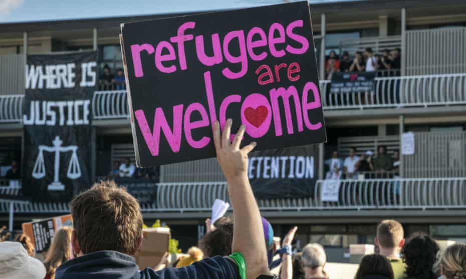 Protesters gather on Sunday to support refugees and asylum seekers detained at the Kangaroo Point Central Hotel &amp; Apartments in Brisbane