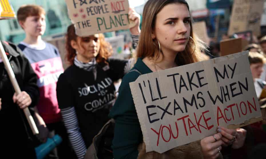 University students and schoolchildren taking part in a climate march in Brighton in 2019.