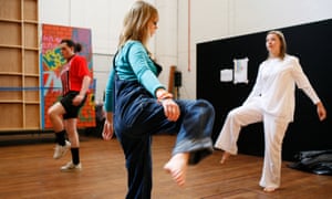 Pupils warm up before a drama class at a Bournemouth school.