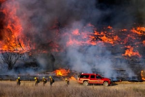 Irwindle, California Firefighters battle brush fire burning in the Santa Fe Dam Recreation Area