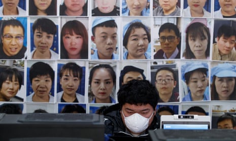 an engineer in beijing works on facial recognition software to identify people when they wear face masks in march this year.