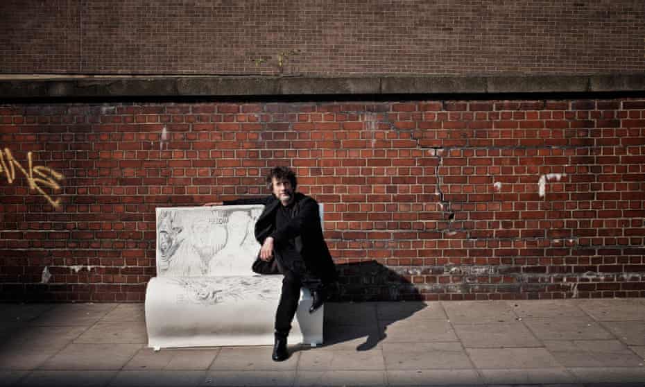  Neil Gaiman sits on a bench in London inspired by Neverwhere.