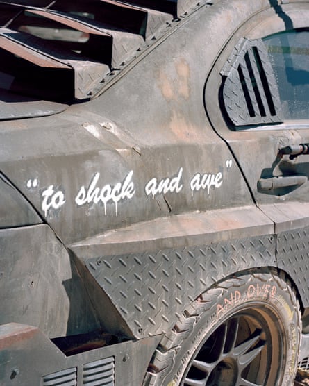 Side panel of an attendee’s car referencing the LAPD’s famous motto.