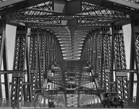 Early cars crossing the Sydney Harbour Bridge