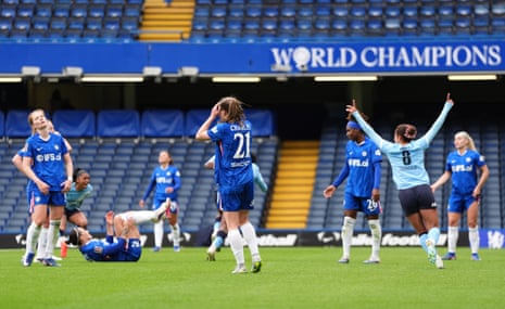 Chelsea's Niamh Charles (centre) and team-mates appear dejected after Manchester City's Khadija Shaw (not pictured) scores their second goal.