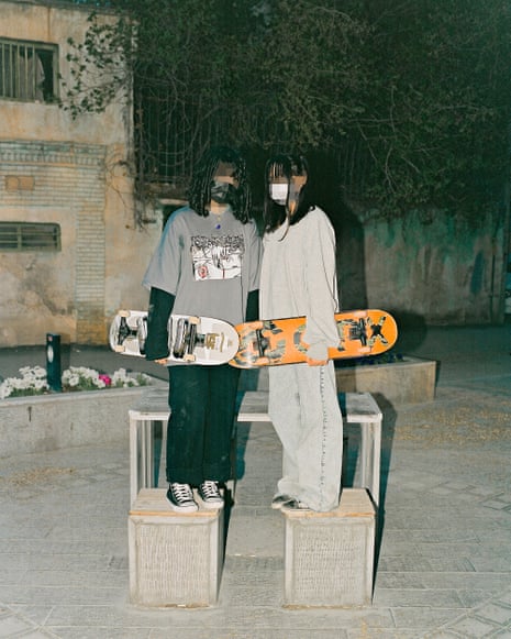 Two girls, both aged 16, on skateboards