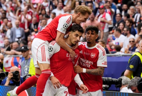 Arsenal’s Kai Havertz (centre) celebrates with team-mates Martin Odegaard (left) and Piero Hincapie.