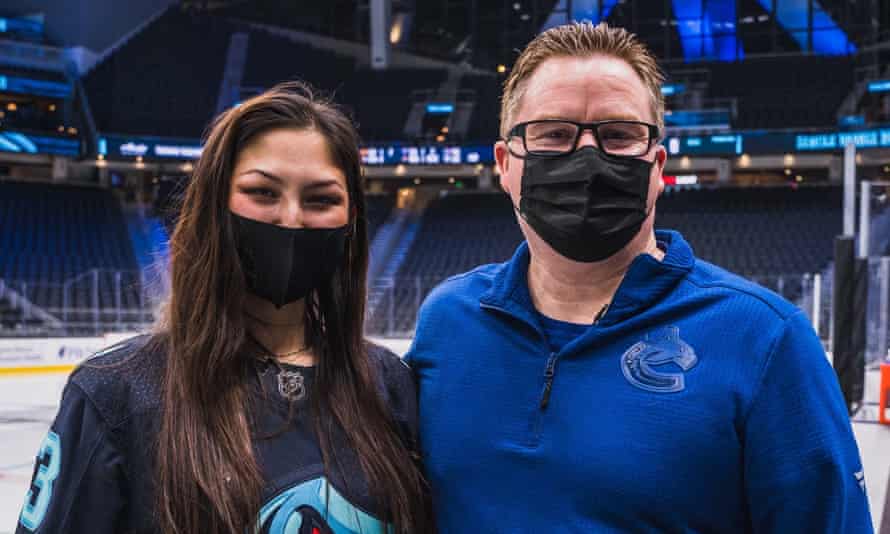 Nadia Popovici and Brian Hamilton, the Vancouver Canucks’ assistant equipment manager, in Seattle.
