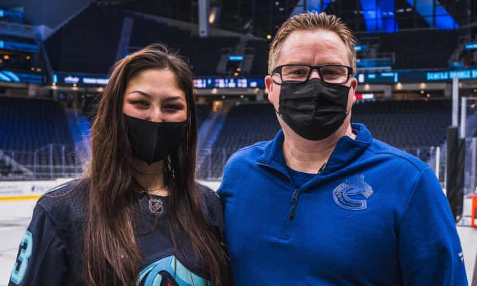 Nadia Popovici and Brian Hamilton, the Vancouver Canucks' assistant equipment manager, in Seattle.