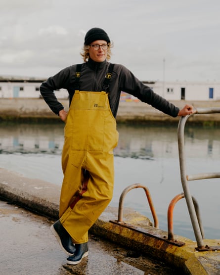 Fisher Will Roberts, 22, on the quay at Newlyn, Cornwall.