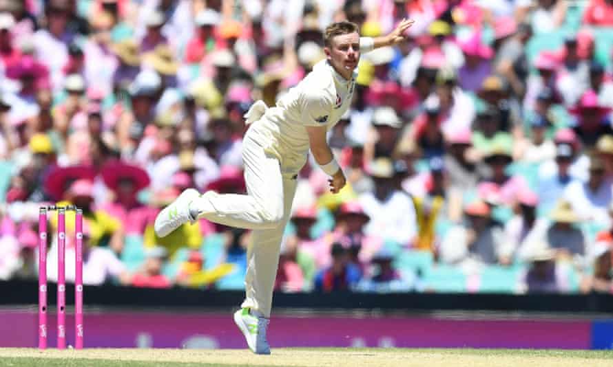 Mason Crane bowling for England in Sydney.