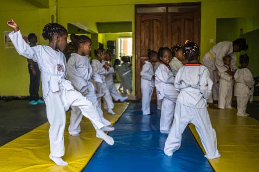 Children participate in a taekwondo class