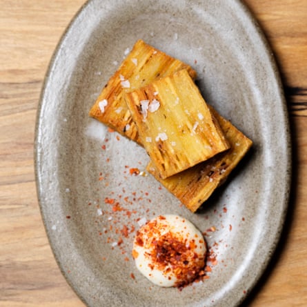Bubala’s confit potato latkes served with ‘a puddle of toum’.