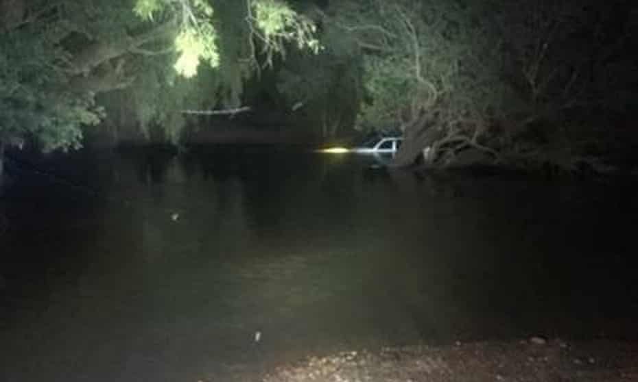 A police image showing the Landcruiser submerged at Dingo Station river crossing in the Northern Territory.